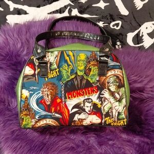 UNIVERSAL MONSTERS PRINT BOWLER BAG GREEN ACCENTS ZIP CLOSURE GOOD CONDITION